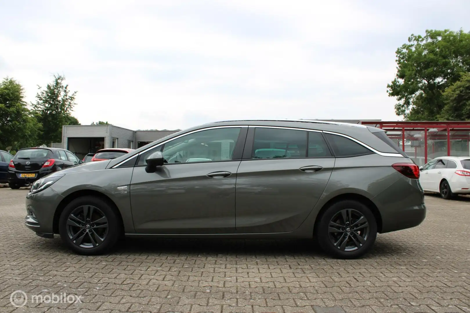 Opel Astra Sports Tourer 1.0 Turbo Business Executive, Parkee Grijs - 2