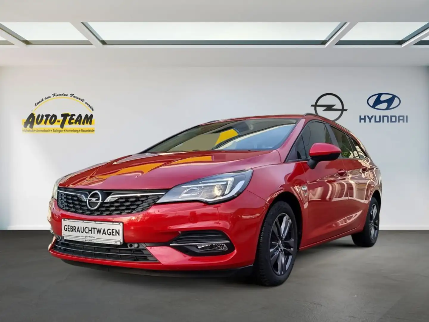 Opel Astra 1.2 Turbo Start/Stop Sports Tourer 120 Jahre Rouge - 1