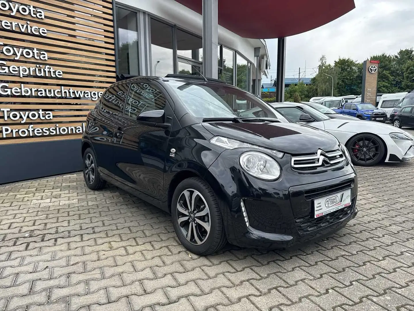 Citroen C1 5-TürerAirscape PureTech 82 Shine Faltdach, SHZ, Schwarz - 2