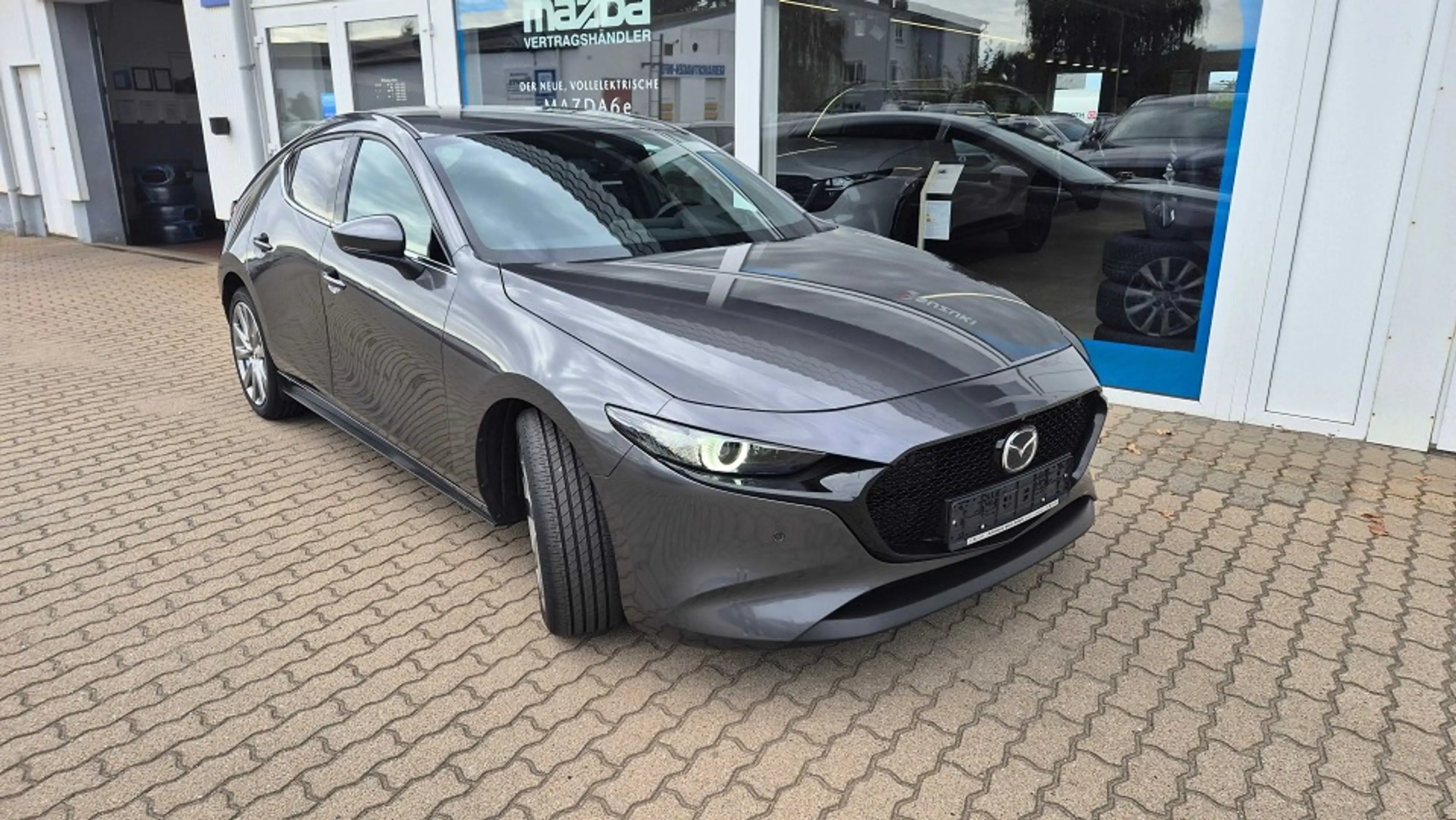 Mazda 3 SKYACTIV-G 2.0 M HYBRID AT FWD SELECTION A18 DES-P