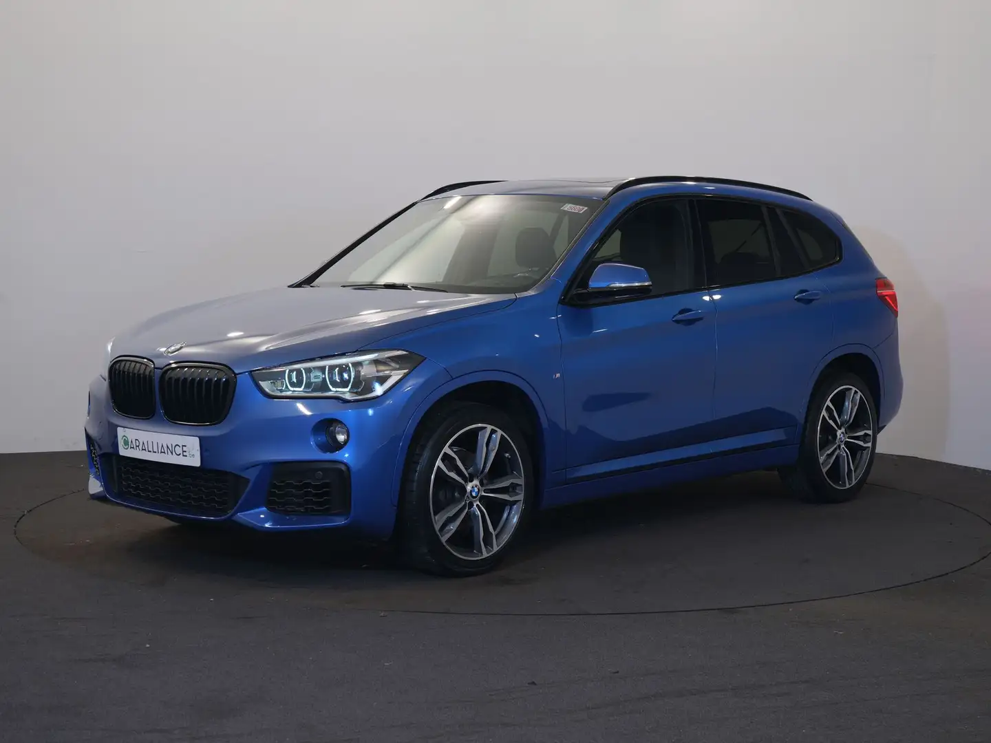 BMW X1 Sport sDrive18i|NAVI|SportM|CAM|Toit.Ouvr|LED| Blauw - 1