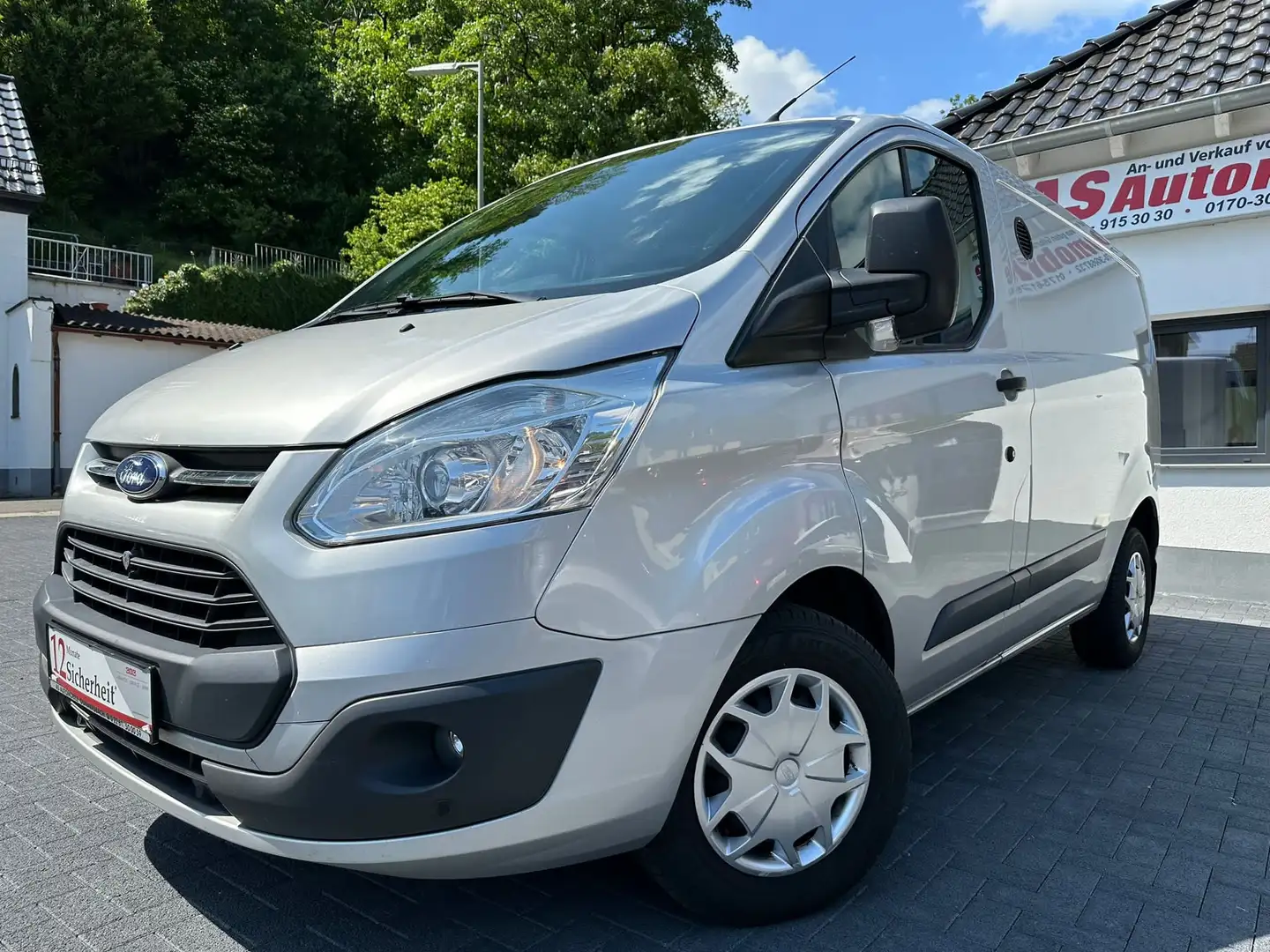 Ford Transit Custom 2.0 TDCI+1.HAND+NAVI+KLIMA+6 GANG+PDC+SHZ Silber - 1