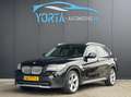 BMW X1 sDrive20i AUTOMAAT*NL AUTO*PANO*TREKHAAK*STOELVERW Zwart - thumbnail 1