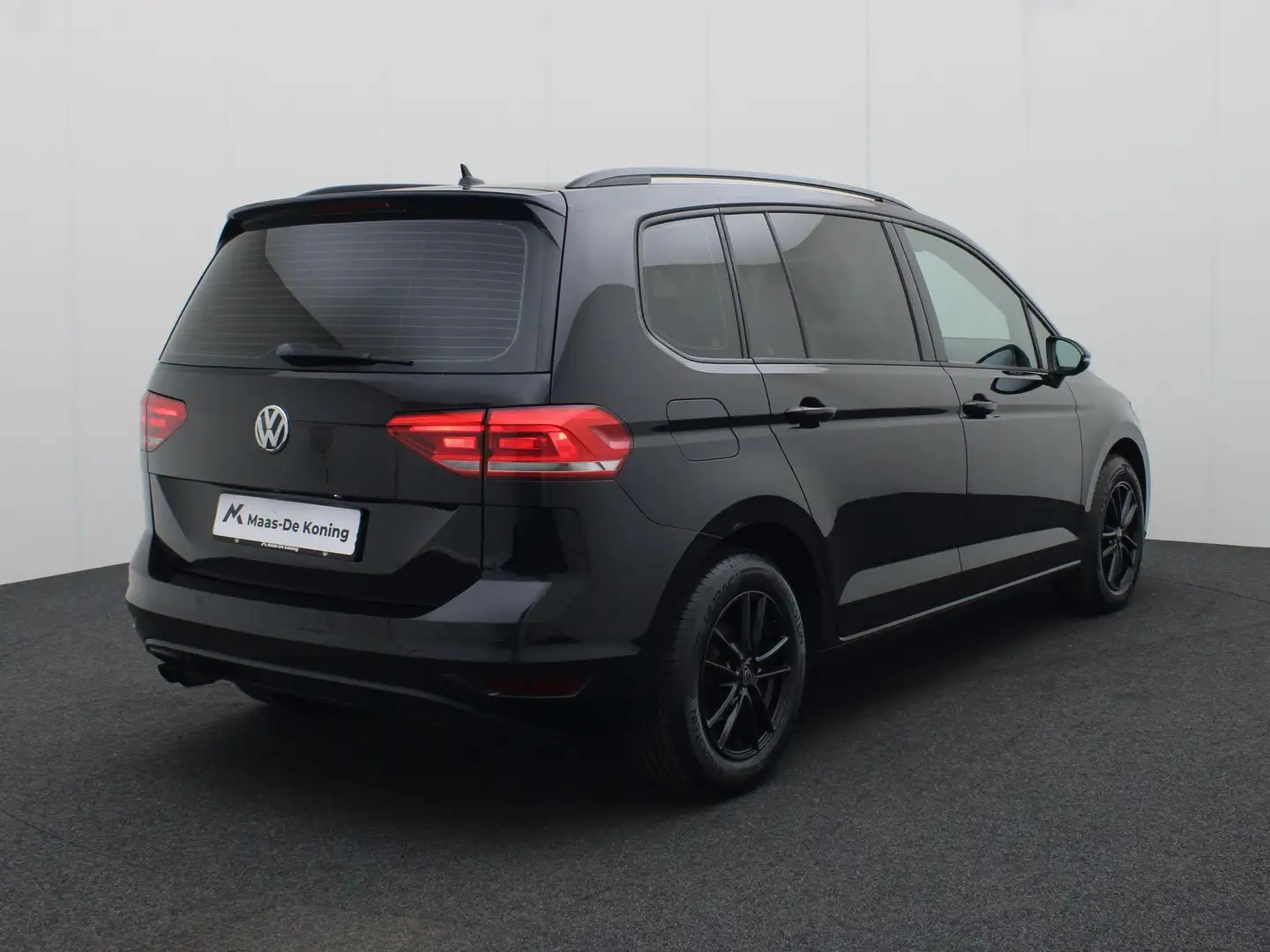 Volkswagen Touran 1.4 TSI 110kW/150PK Comfortline DSG 7-Persoons · N Zwart - 2