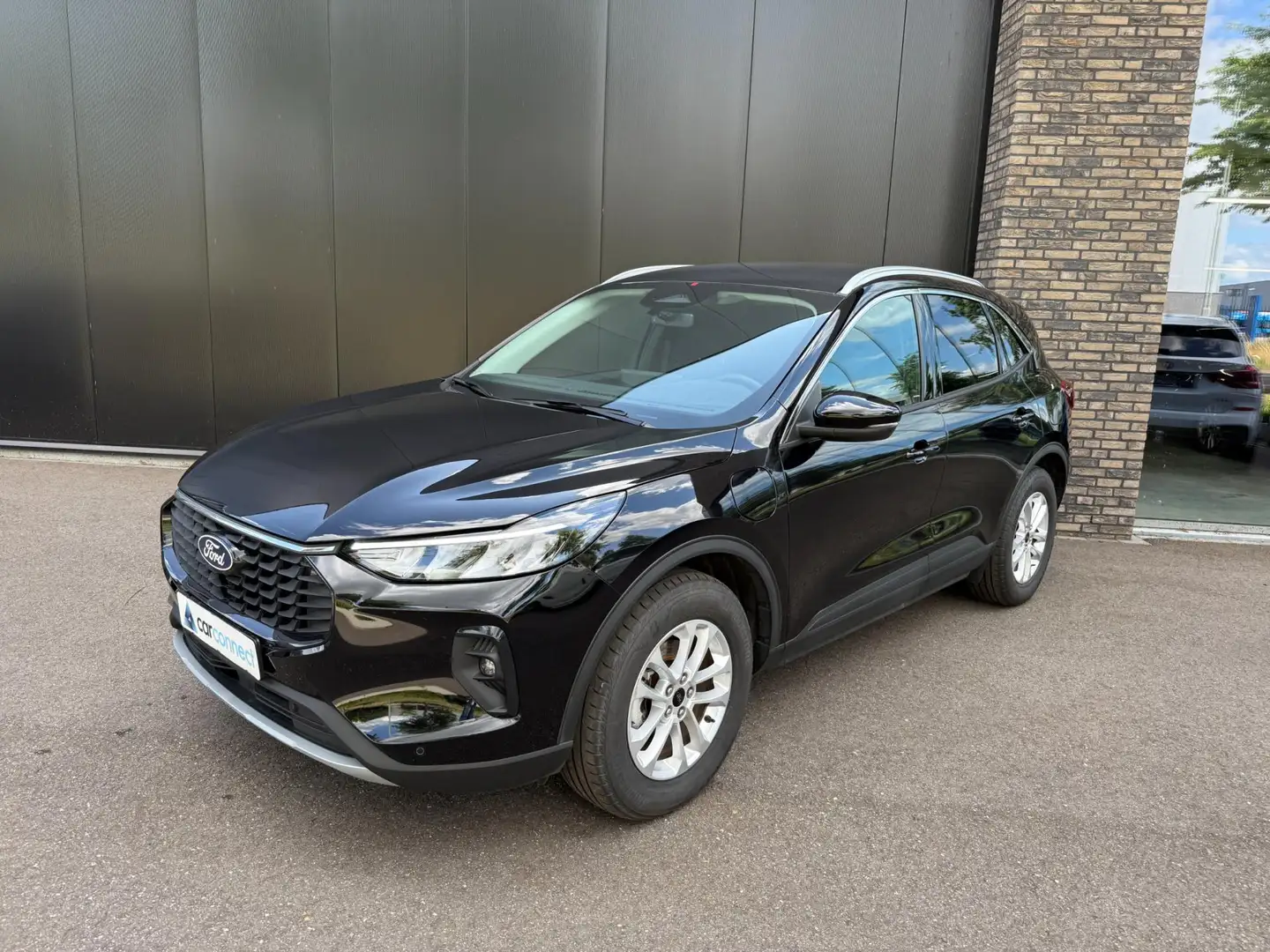 Ford Kuga 2.5 243pk PHEV Titanium Navi, Winter pack, Camera, Zwart - 1