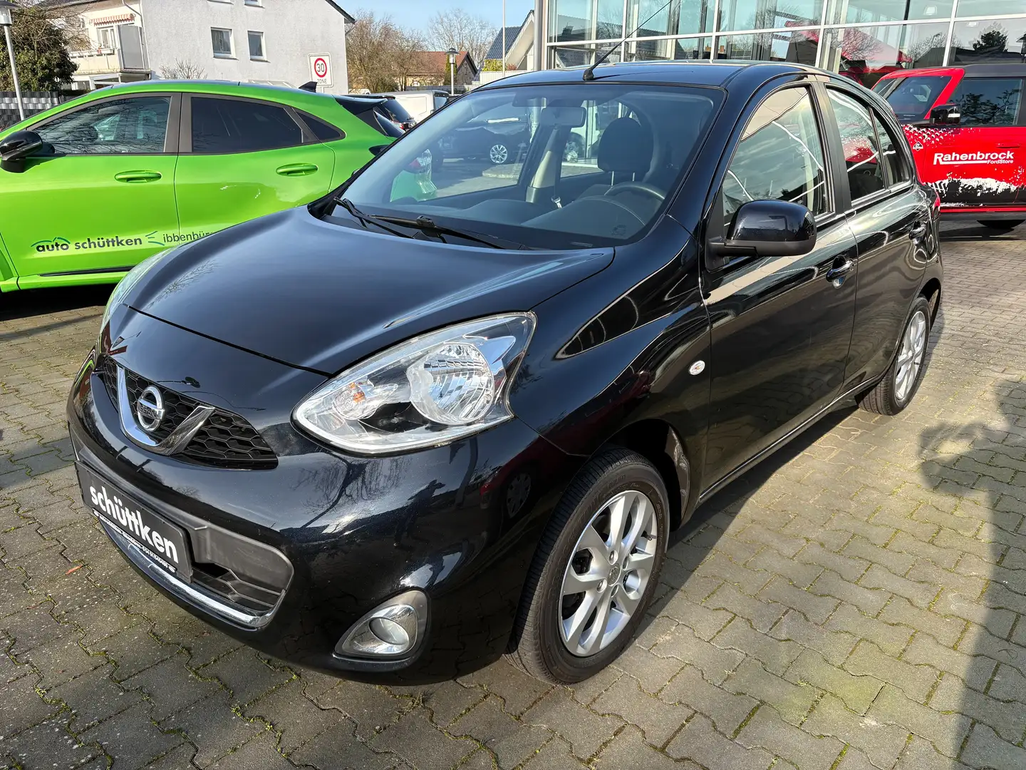 Nissan Micra 1.2 Visia First ALU, TeleBT, Klima, USB/AUX, GRA Schwarz - 1