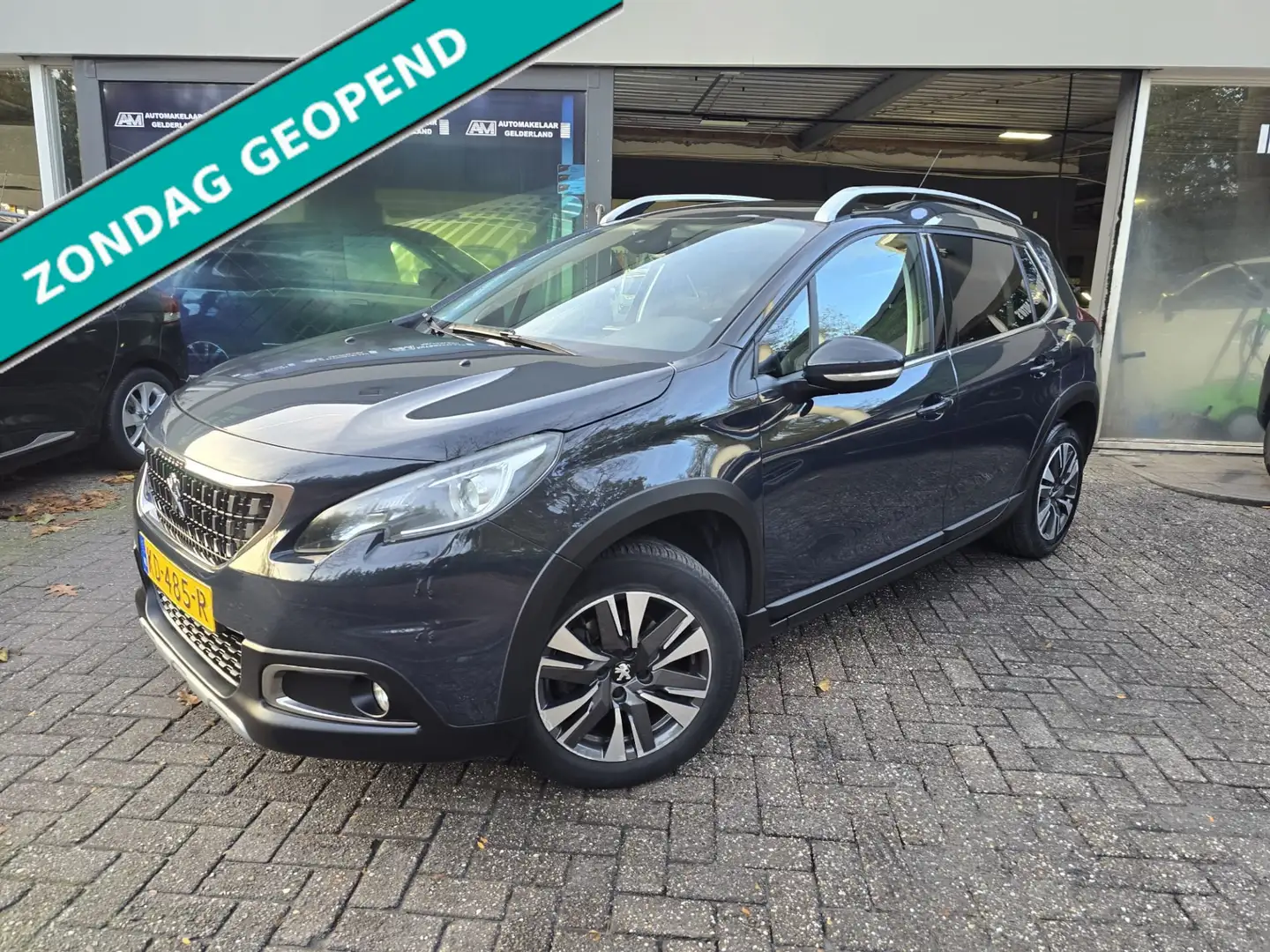 Peugeot 2008 1.2 PureTech Blue Lease Executive | 2E EIGENAAR | Grigio - 1