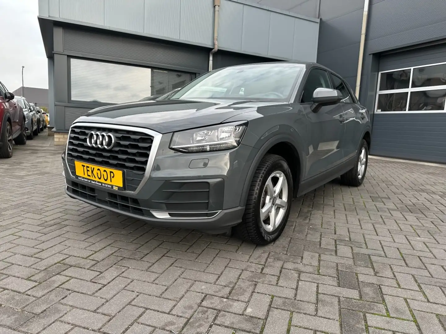 Audi Q2 1.0 TFSi Design ProLine Aut. Navigatie Grau - 1