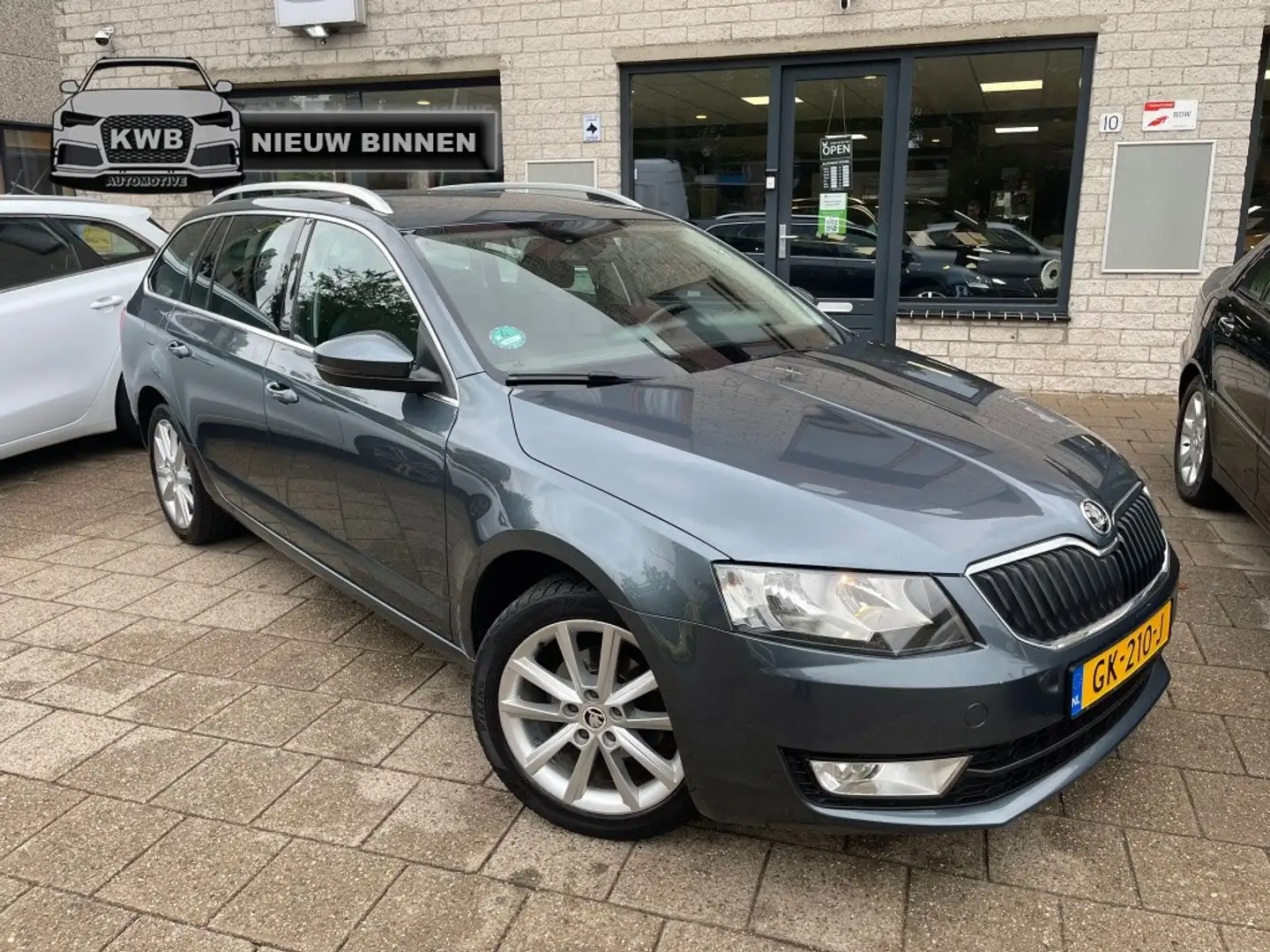 Skoda Octavia Combi 1.2 TSI Trekhaak Airco Distributie VV Grijs - 1
