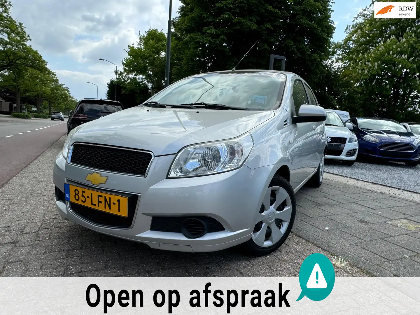 Chevrolet Aveo 1.2 16V LS A-C Elek Pakket Trekhaak Nw Apk Grijs - 1