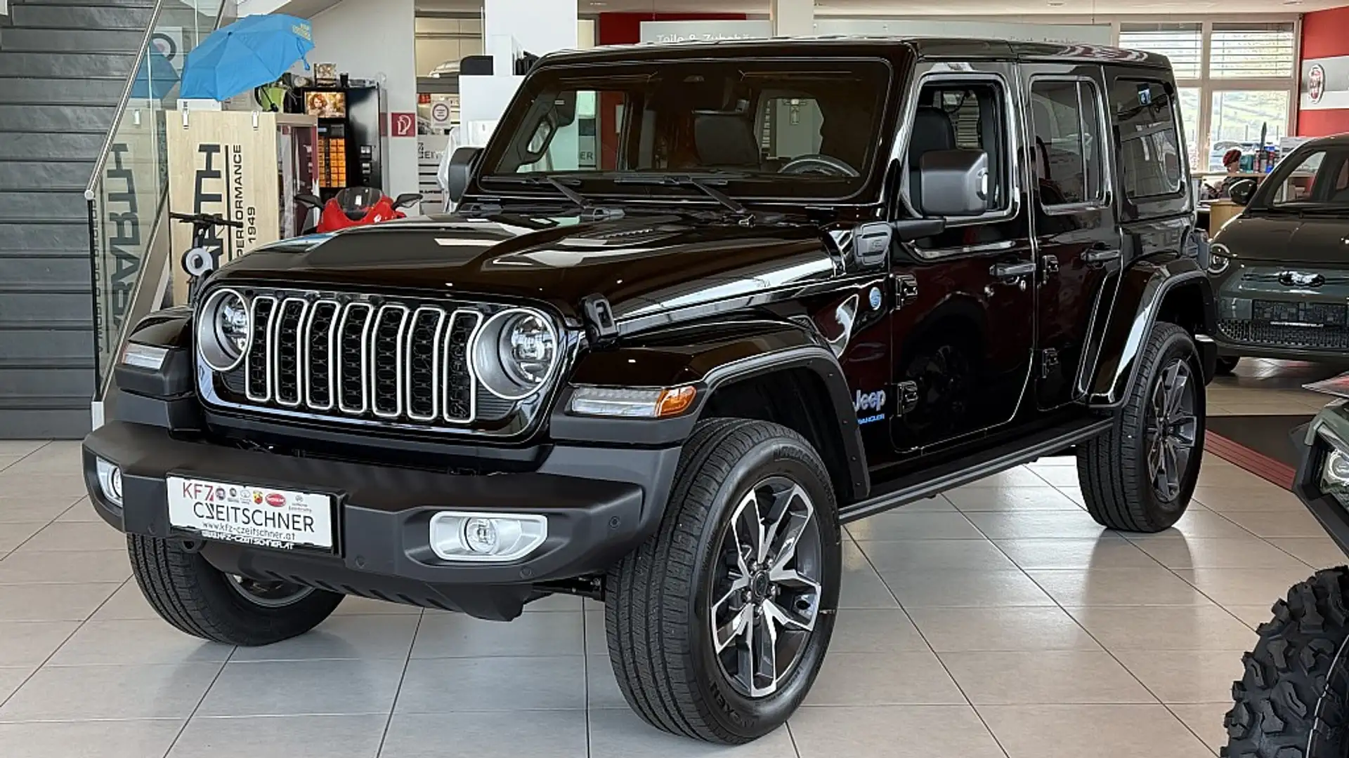 Jeep Wrangler Sahara 2.0 PHEV 380 PS AT 4xe Schwarz - 1