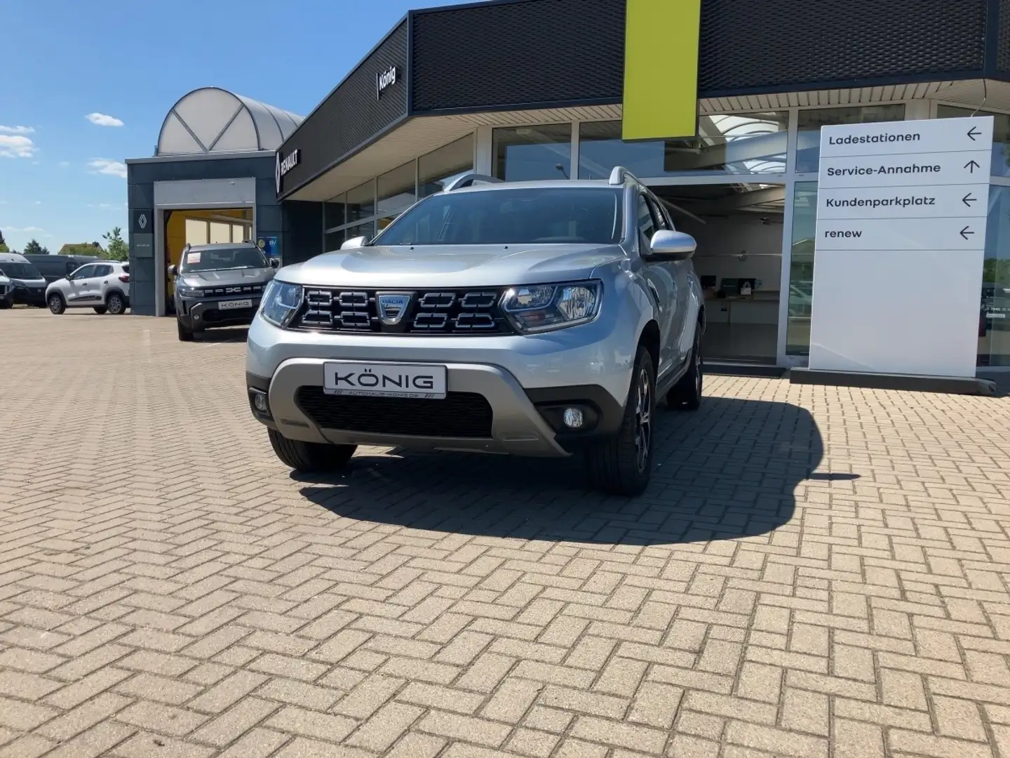 Dacia Duster 1.5 dCi 115, Klimaautomatik*Navi*AHK*PD Prestige Grau - 1