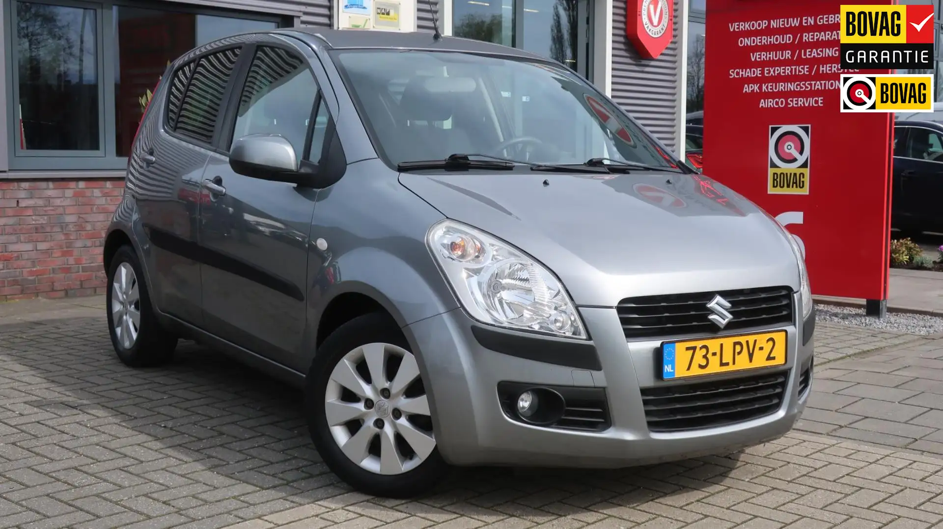 Suzuki Splash 1.0 Exclusive / Airco / Elek. ramen Gris - 1