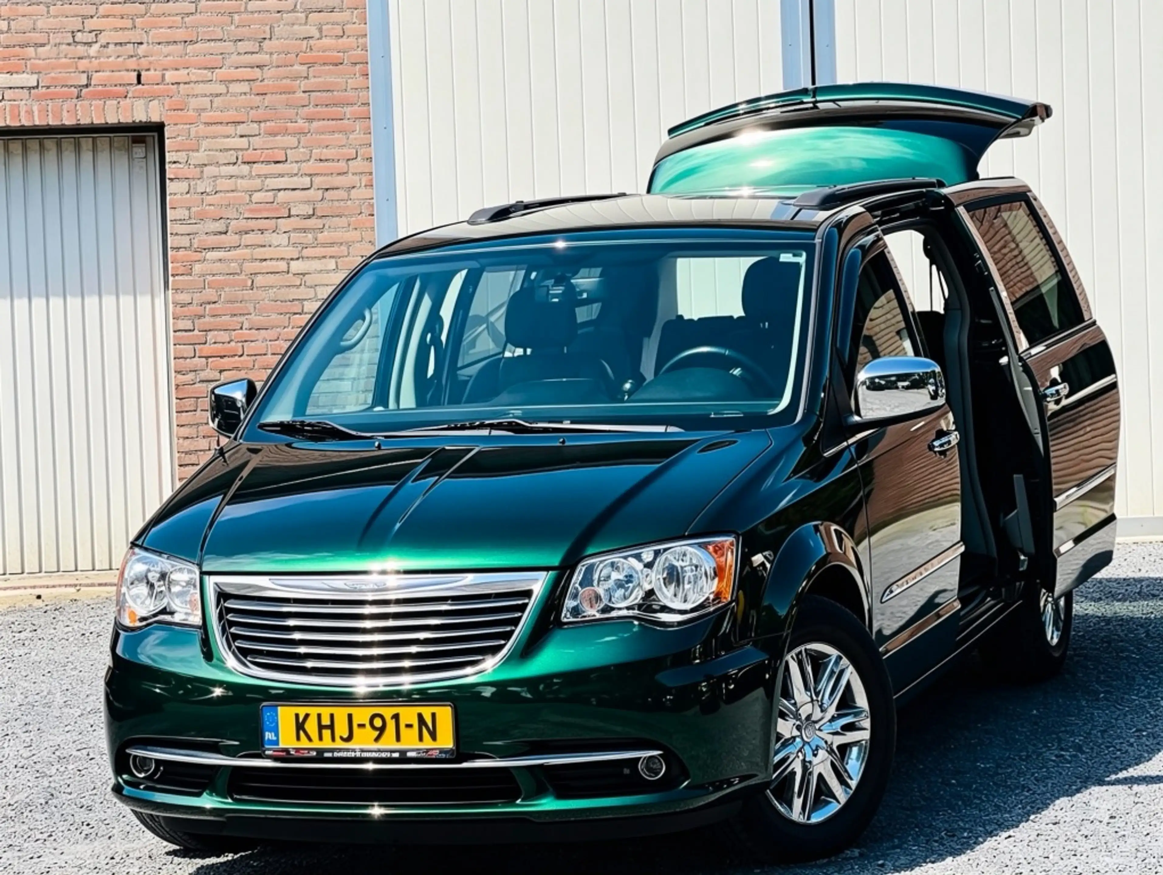 Chrysler Grand Voyager 3.6 V6 LIMITED J.DAIMLER EMERALD-GREEN TV/DVD/HDMI — photo 10