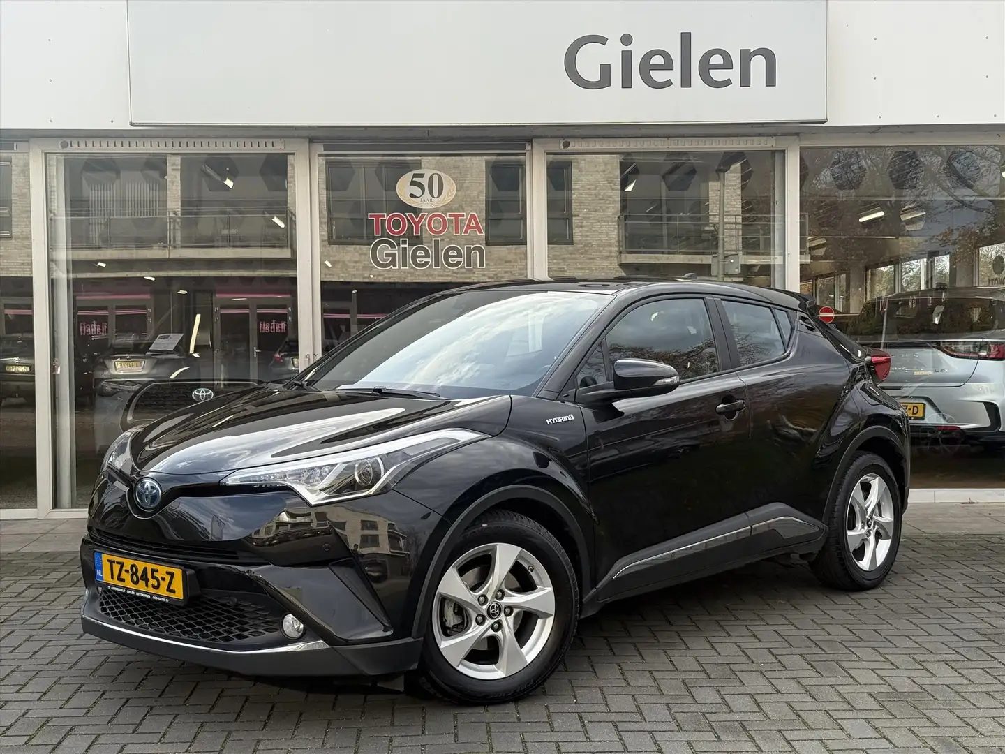 Toyota C-HR 1.8 Hybrid Dynamic | Navigatie, Dodehoekherkenning Zwart - 1