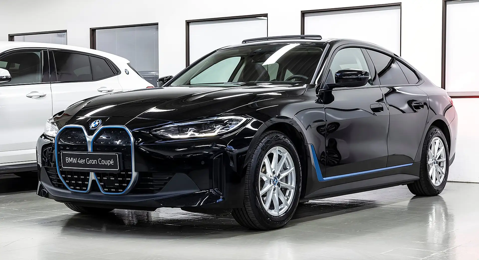 BMW i4 eDrive40 Gran Coupe LED LCP HUD AG+ACC KAM PAN DAB Schwarz - 1