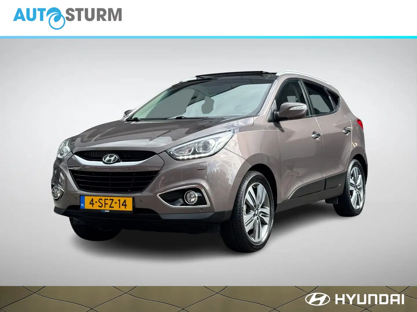 Hyundai iX35 2.0i i-Catcher Automaat | Panoramadak | Navigatie Brun - 1