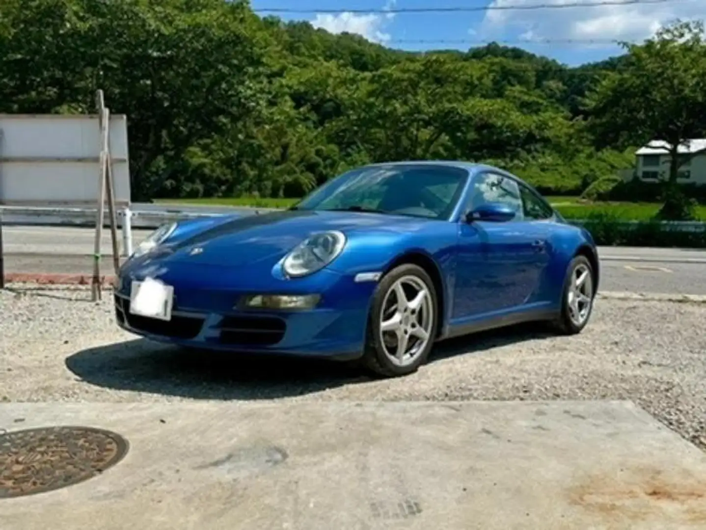 Porsche 997 carrera 4 Blauw - 1
