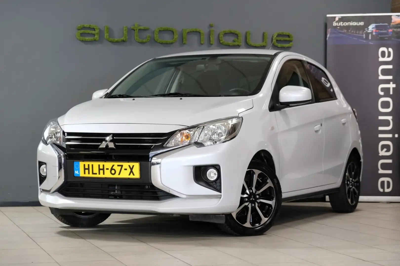 Mitsubishi Space Star 1.2 *Navigatie/Apple Carplay* 62dkm PARELMOER WIT Wit - 1