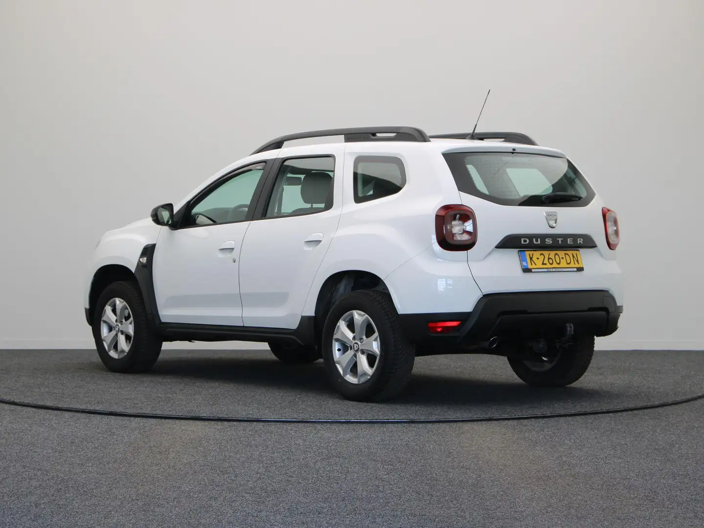 Dacia Duster TCe 100pk Bi-Fuel Comfort | Trekhaak | Navigatie | Wit - 2