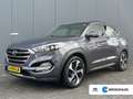 Hyundai TUCSON 1.6 T-GDi 177pk Premium 4WD Automaat | Camera | Sc Grijs - thumbnail 1