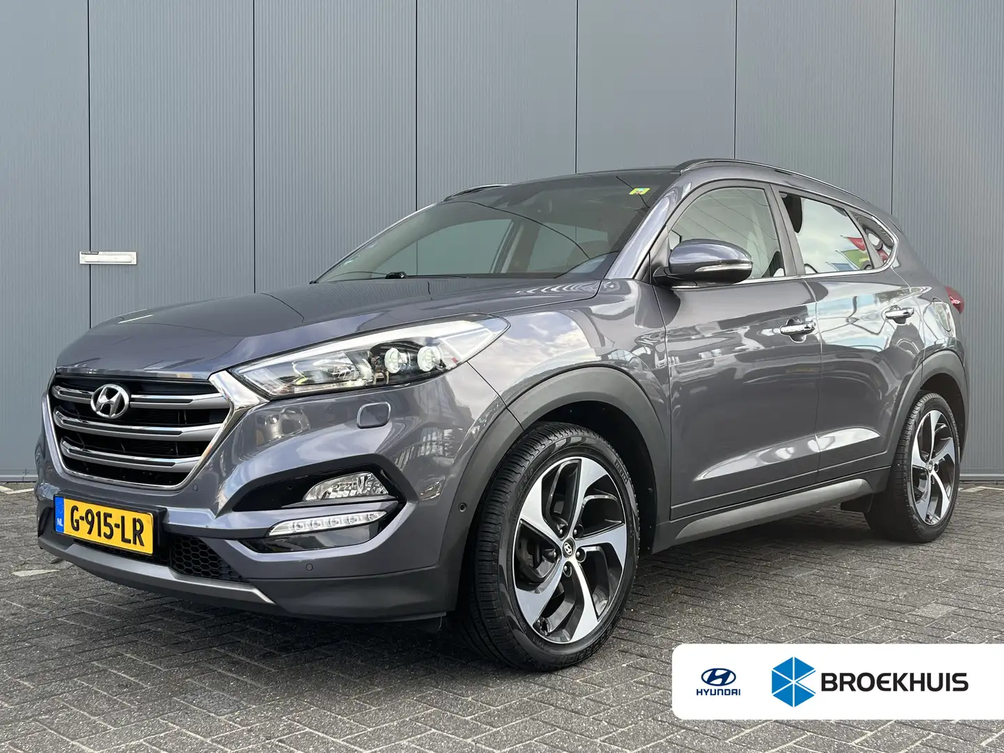 Hyundai TUCSON 1.6 T-GDi 177pk Premium 4WD Automaat | Camera | Sc Grijs - 1
