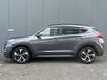 Hyundai TUCSON 1.6 T-GDi 177pk Premium 4WD Automaat | Camera | Sc Grijs - thumbnail 2