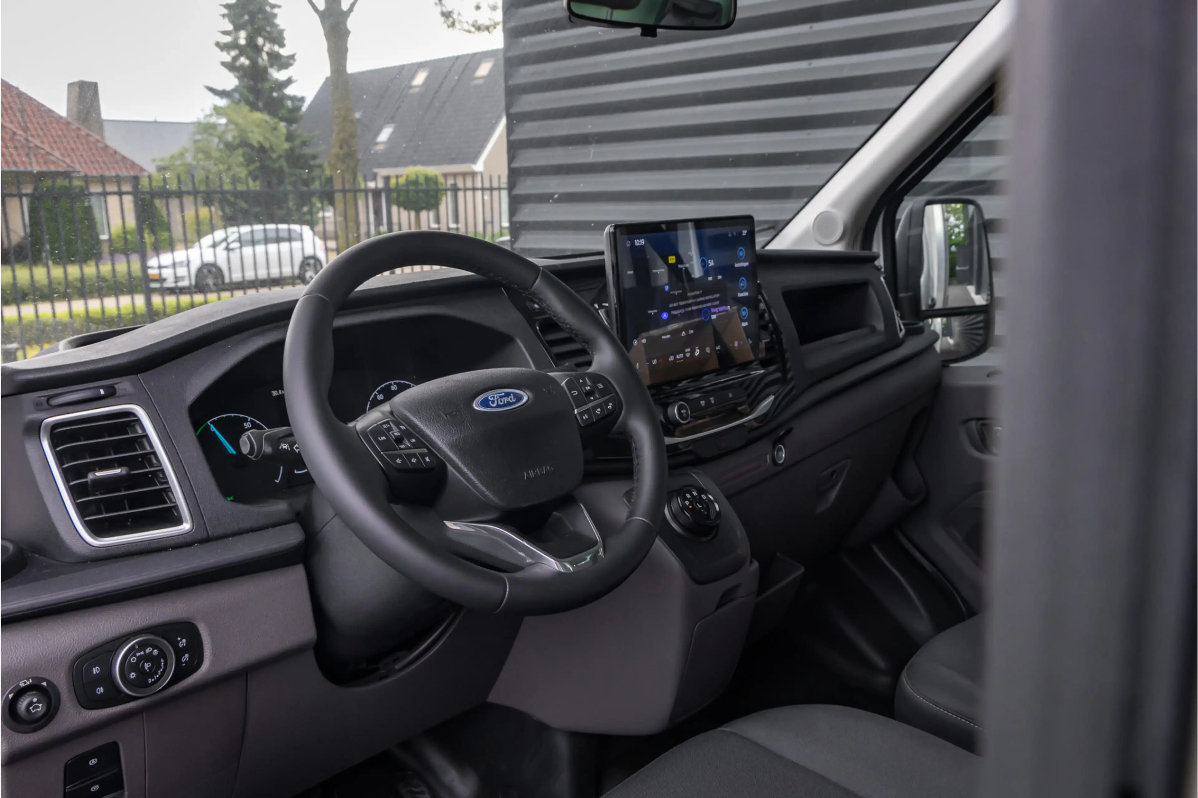 Ford E-Transit Bakwagen met laadklep Rolstops — photo 7