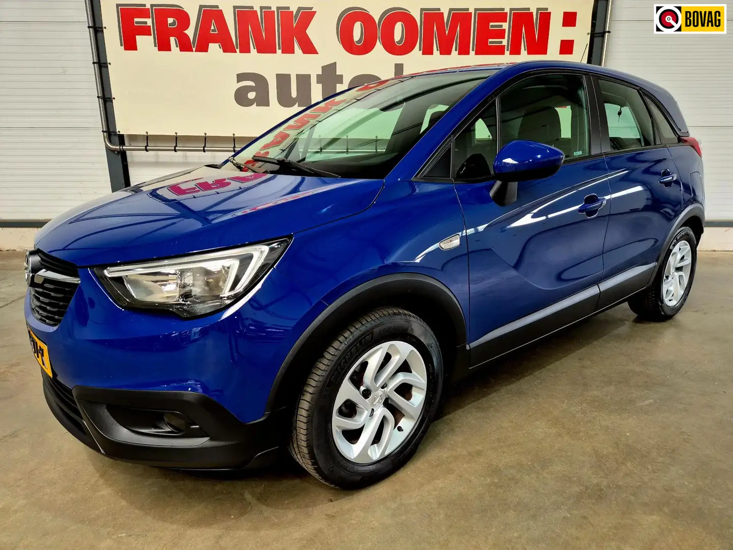 Opel Crossland X 1.2 82PK Online Edition + Dealer OH|Apple|Android| Blauw - 1