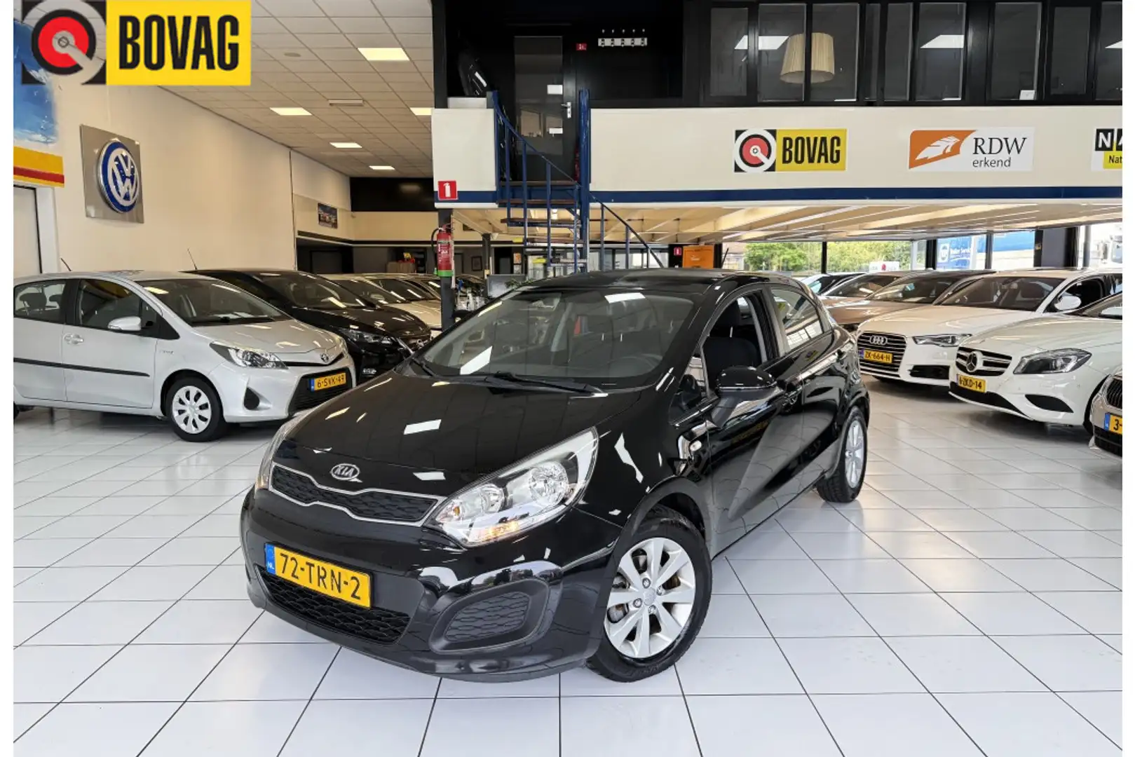 Kia Rio 1.2 CVVT Comf. Pack Zwart - 1