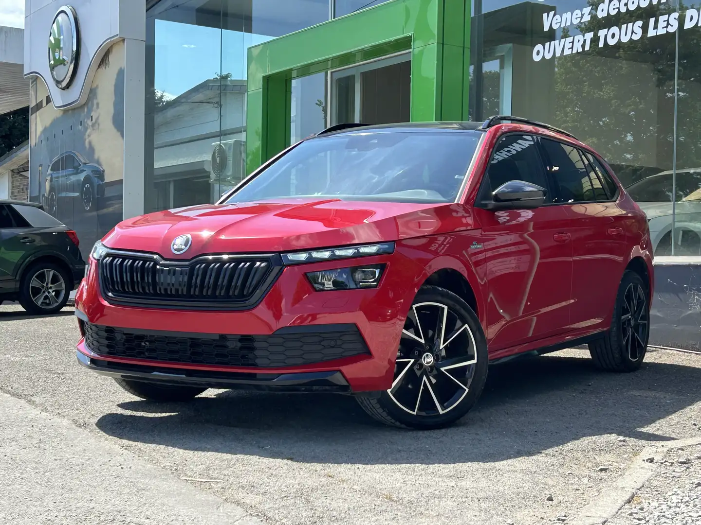 Skoda Kamiq 1.0TSI Monte Carlo •CarPlay•Navi•Toit Pano Rood - 1