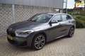 BMW X2 XDrive20i High Executive M Sport Autom Sportst Sto Grijs - thumbnail 1