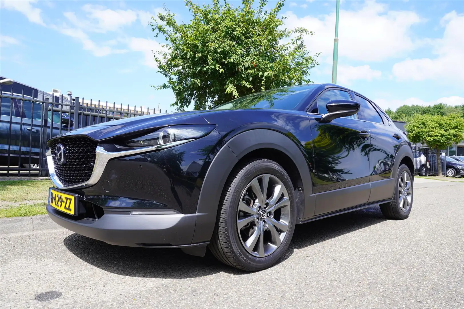 Mazda CX-30 Skyactiv-X 180pk Aut Luxury Navi Clima Leder Mooi Zwart - 1