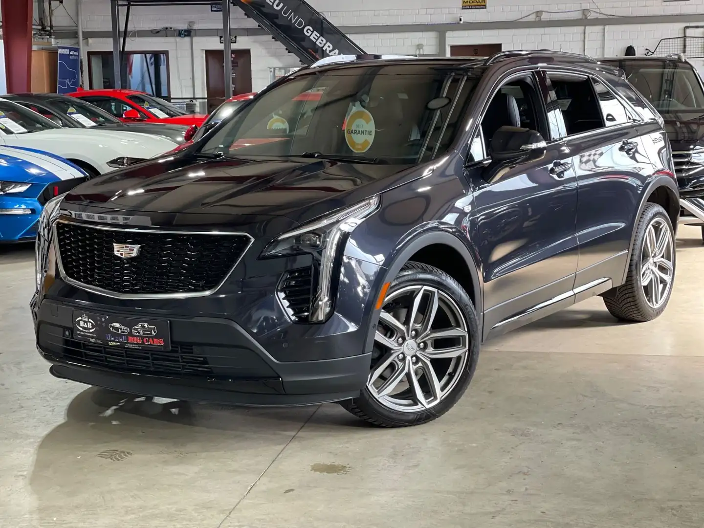 Cadillac XT4 SPORT+AWD+PANO+SHZ+HUD+BOSE+A.KUPPLUNG+GARANTIE Gris - 1