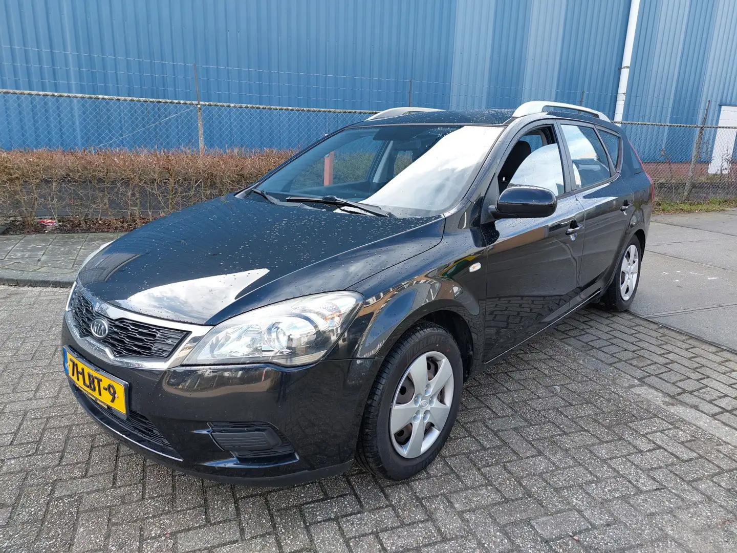 Kia Ceed / cee'd Sporty Wagon 1.4 CVVT X-tra AIRCO Schwarz - 1