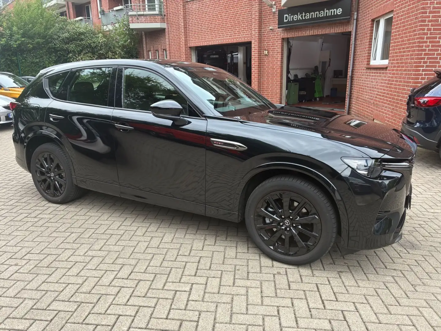 Mazda CX-60 Homura 2.5 e-SKYACTIV PHEV AWD Modell 2025 Schwarz - 1