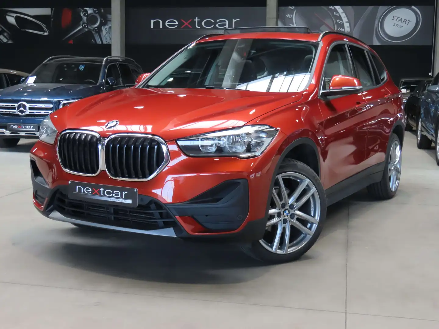 BMW X1 16dA SDrive NAVI PRO-SIEGES SPORT-HUD-CRUISE-PANO Orange - 1