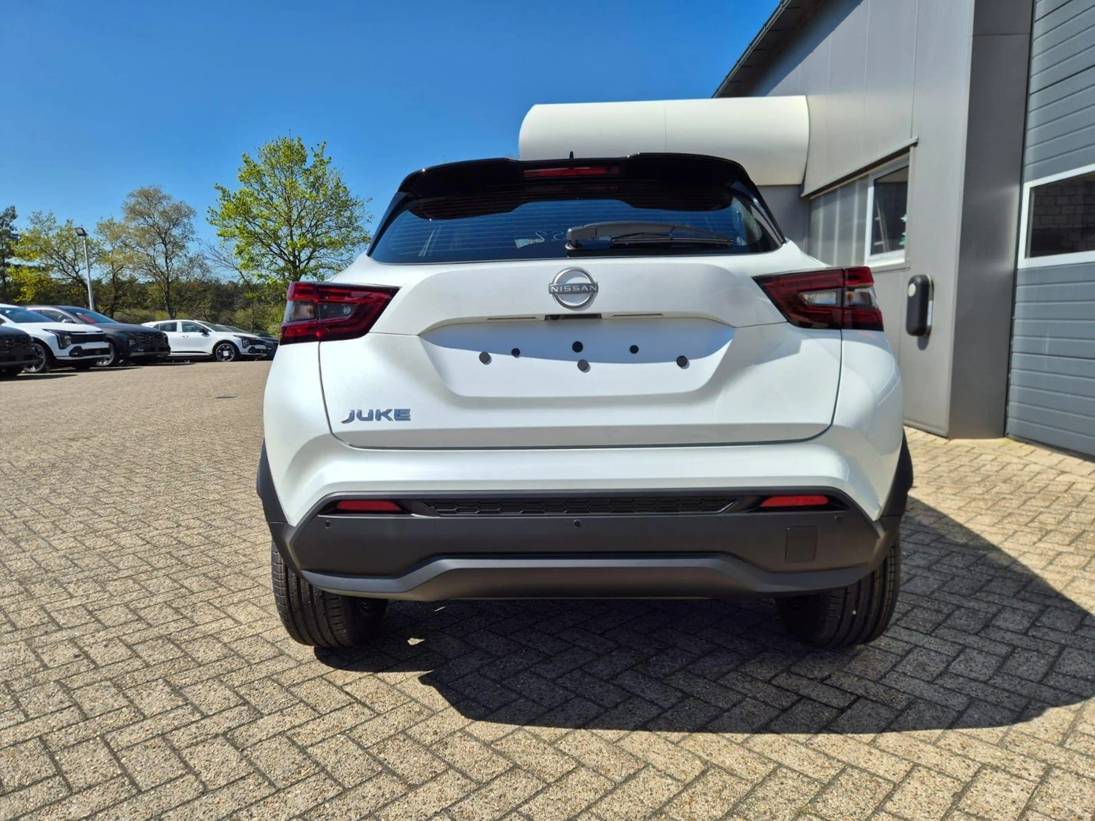 Nissan Juke 1.0 DIG-T 114PS N-Connecta Teil-Leder Klimaauto... — photo 4