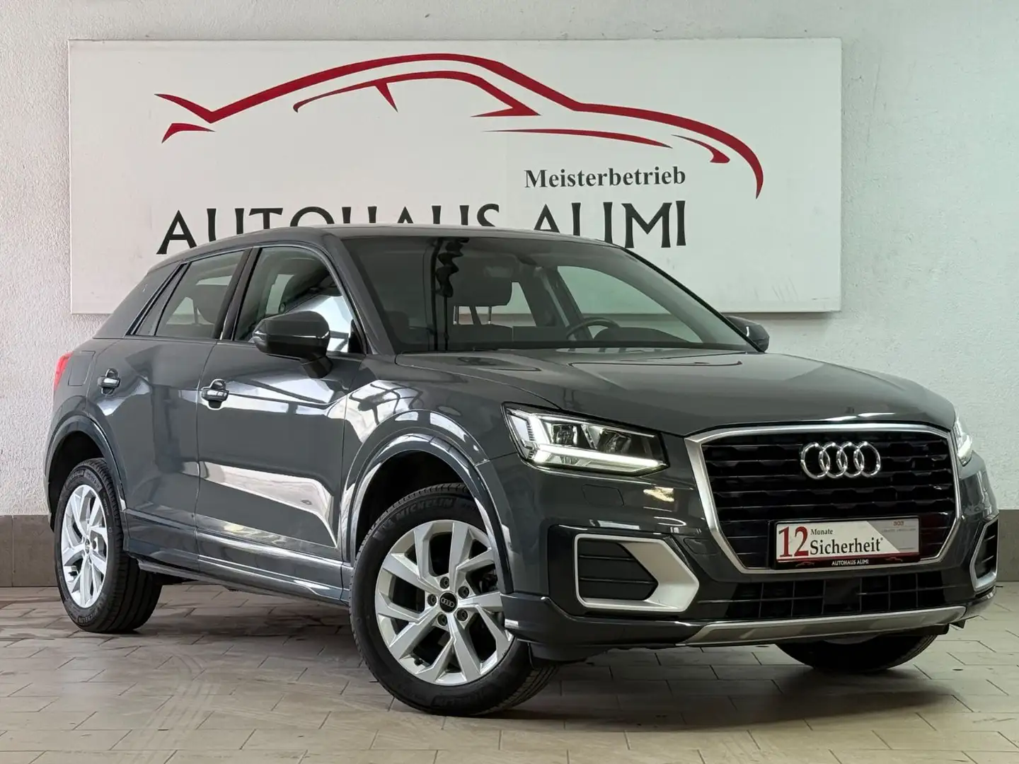 Audi Q2 30 TDI design S tronic DAB SHZ AHK LED Grau - 1