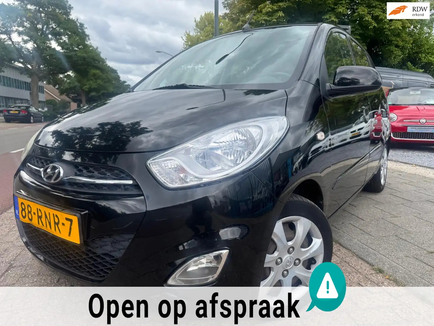 Hyundai i10 1.1 i-Drive Cool A-C Elek-Pakket N.A.P Aux/Usb Nw Noir - 1