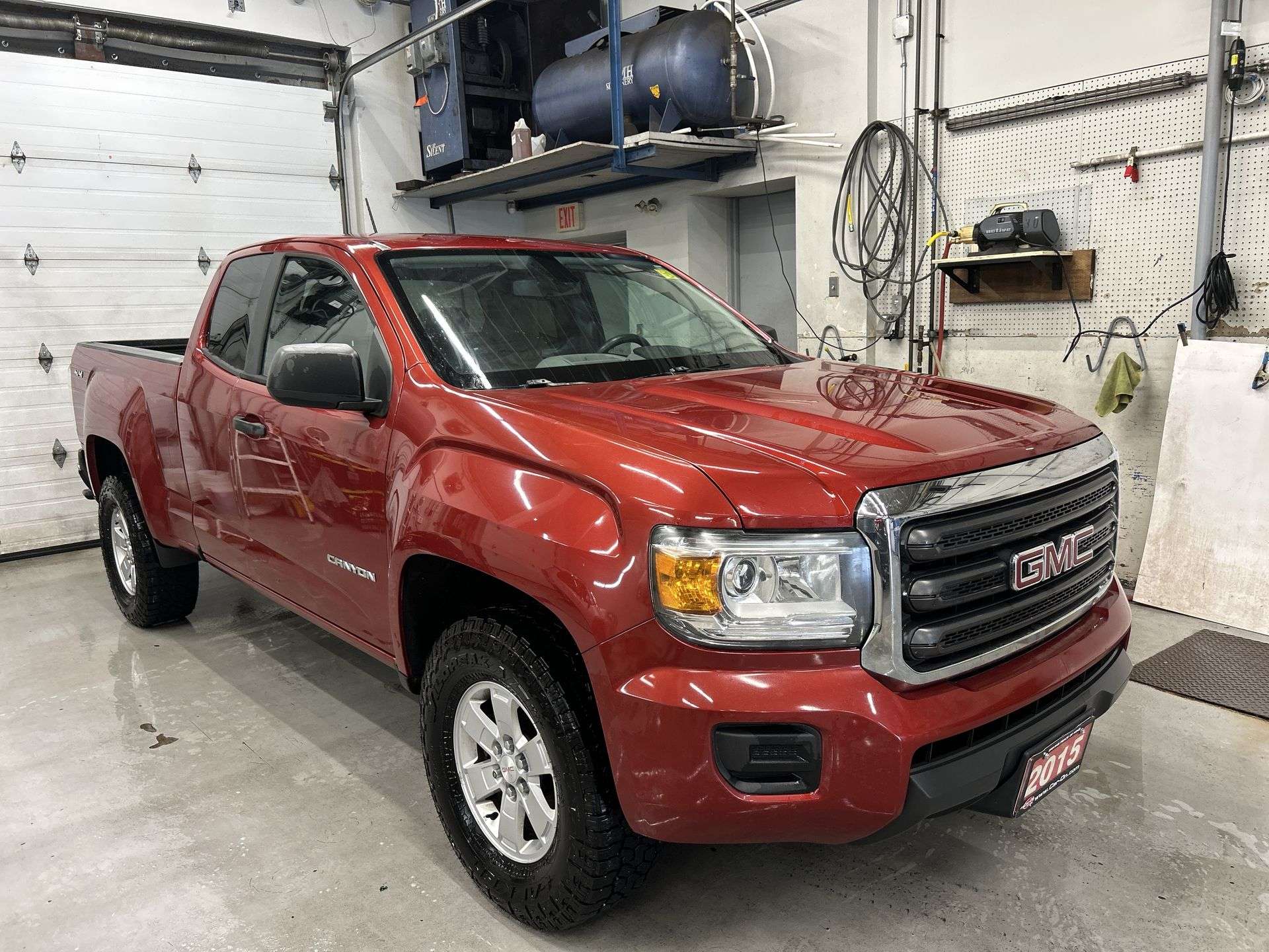 Red 2015 GMC Canyon Pickup Truck Four-Wheel Drive Automatic