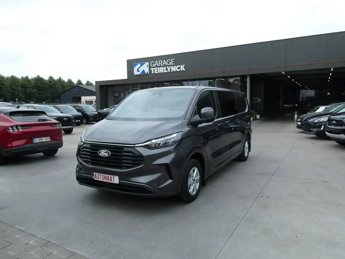 Ford Transit Custom L2 Multi-Use 6pl 2.0 TDCi 170pk Automaat Limited Luxe STOCK '26 (74329) Gris - 1