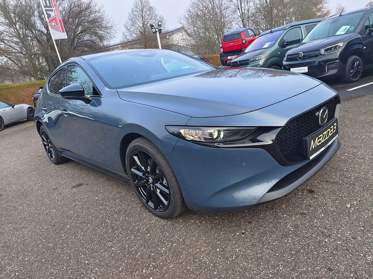 Mazda 3 Mazda3 e-Skyactiv-G140 Homura Blau - 1