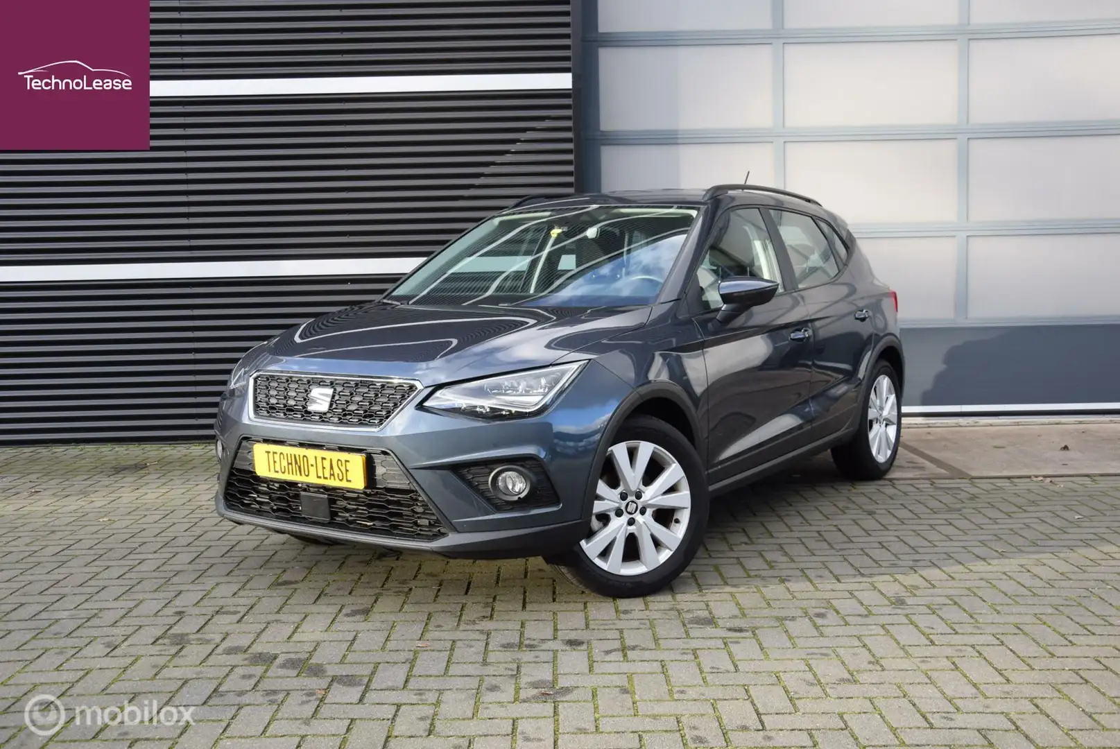 SEAT Arona 1.0 TSI Style Stoelverwarming LED PDC Apple Carpla Grijs - 1
