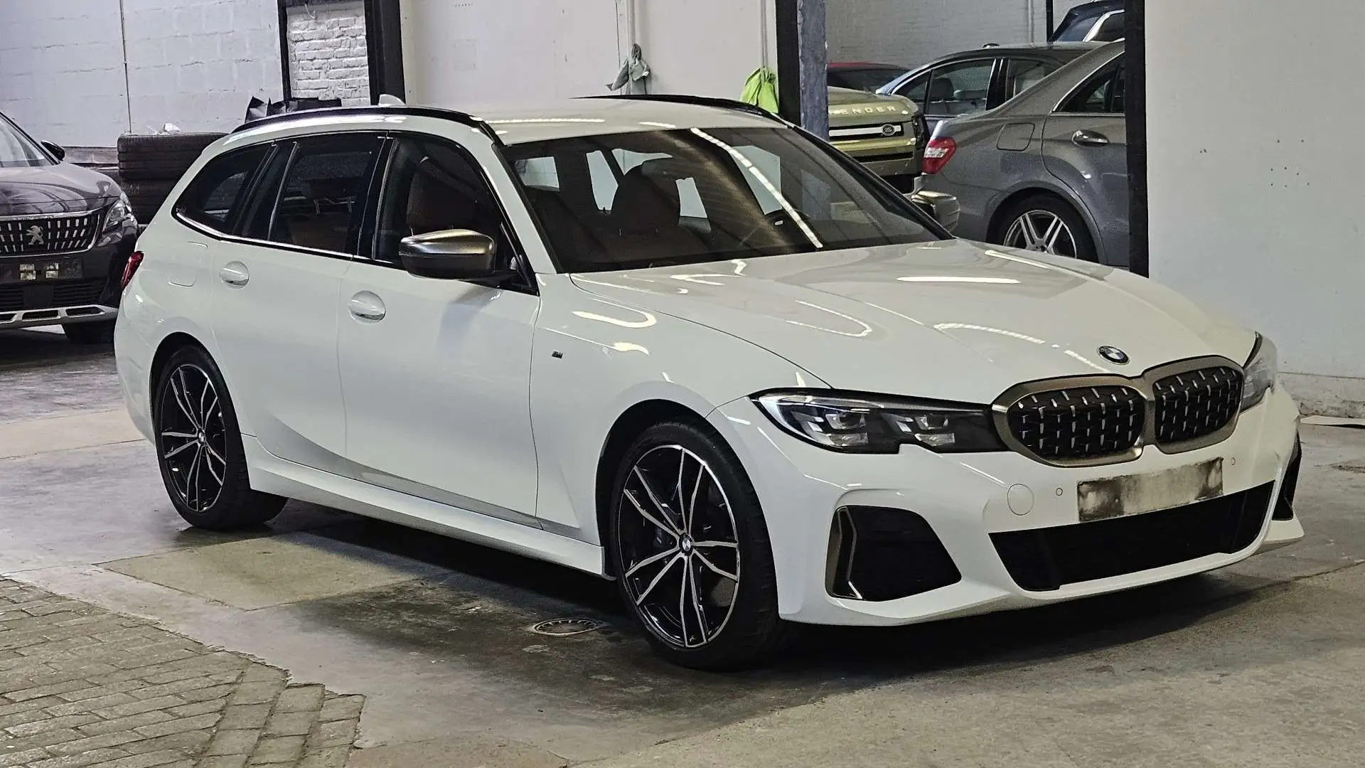 BMW 340 Touring M340iXAS OPF MPACK Wit - 1