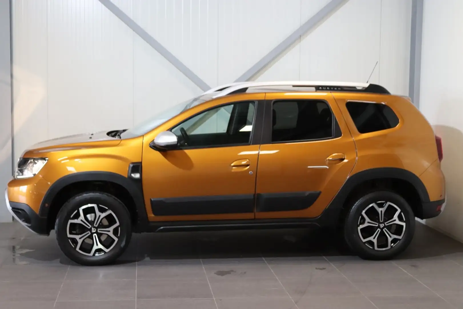 Dacia Duster 1.2 TCe Prestige |Trekhaak|Climate|Cruise Oranje - 2