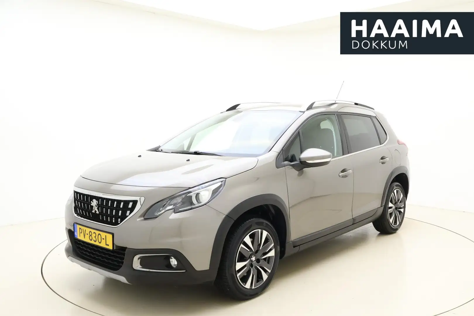 Peugeot 2008 1.2 PureTech Allure 110pk | Navigatie | Camera | L Grijs - 1