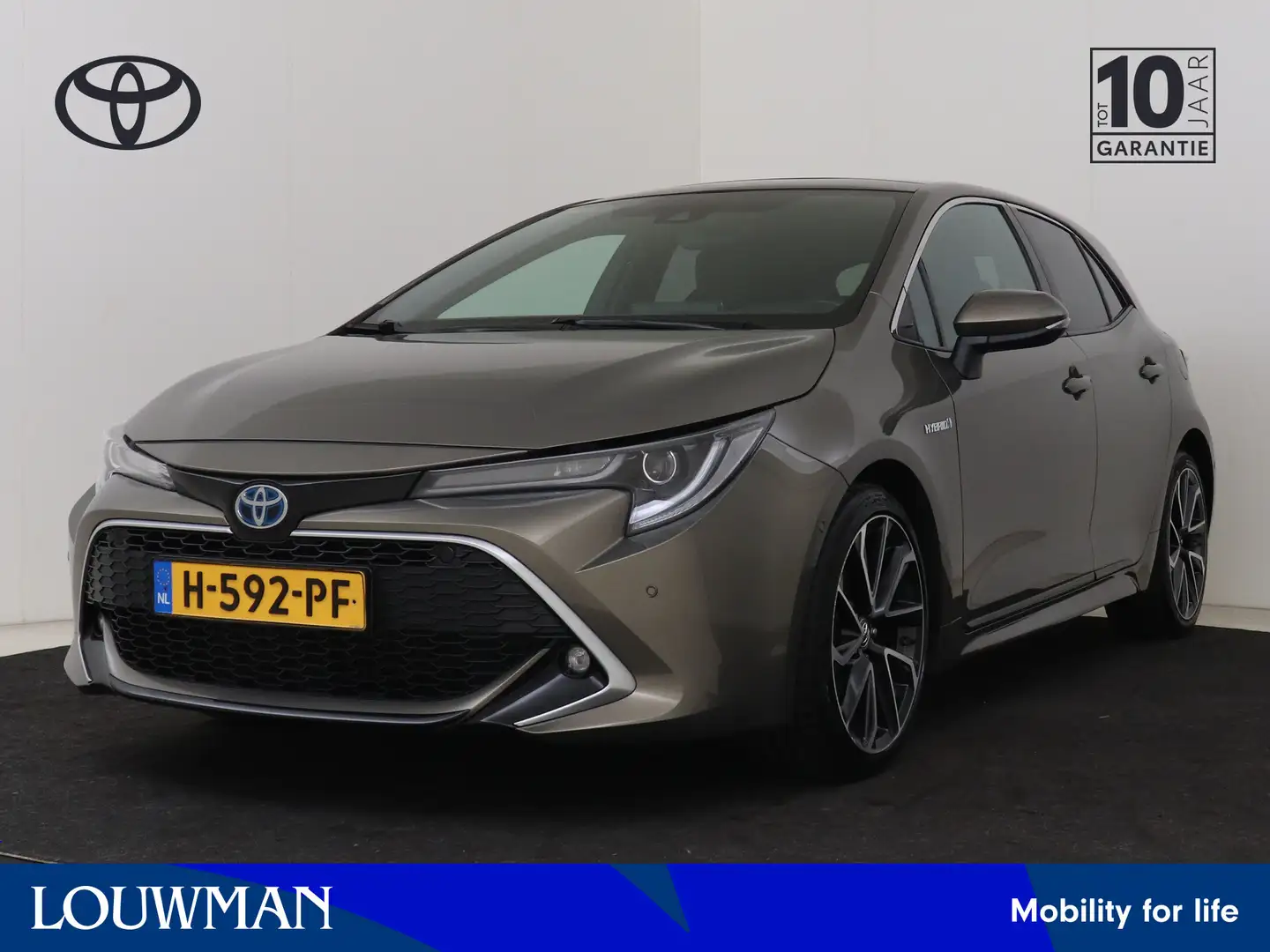 Toyota Corolla 1.8 Hybrid Executive Pano I Navigatie I Climate Co Groen - 1