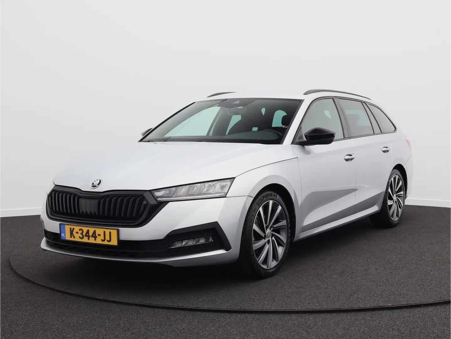 Skoda Octavia Combi 1.0 TSI Sport Business/ lage km/ trekhaak! Grijs - 1
