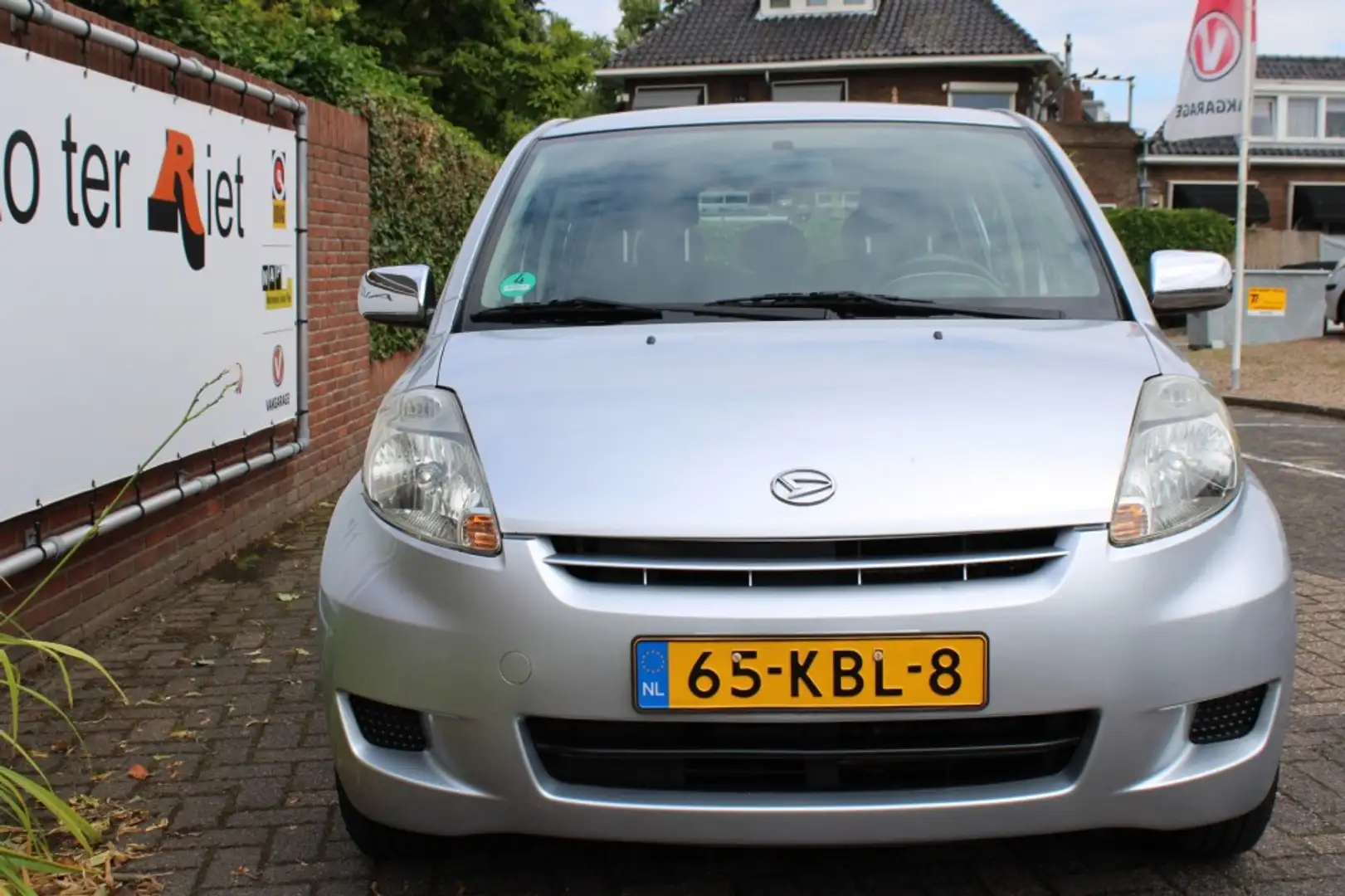 Daihatsu Sirion 1.0 12V Premium Grijs - 2